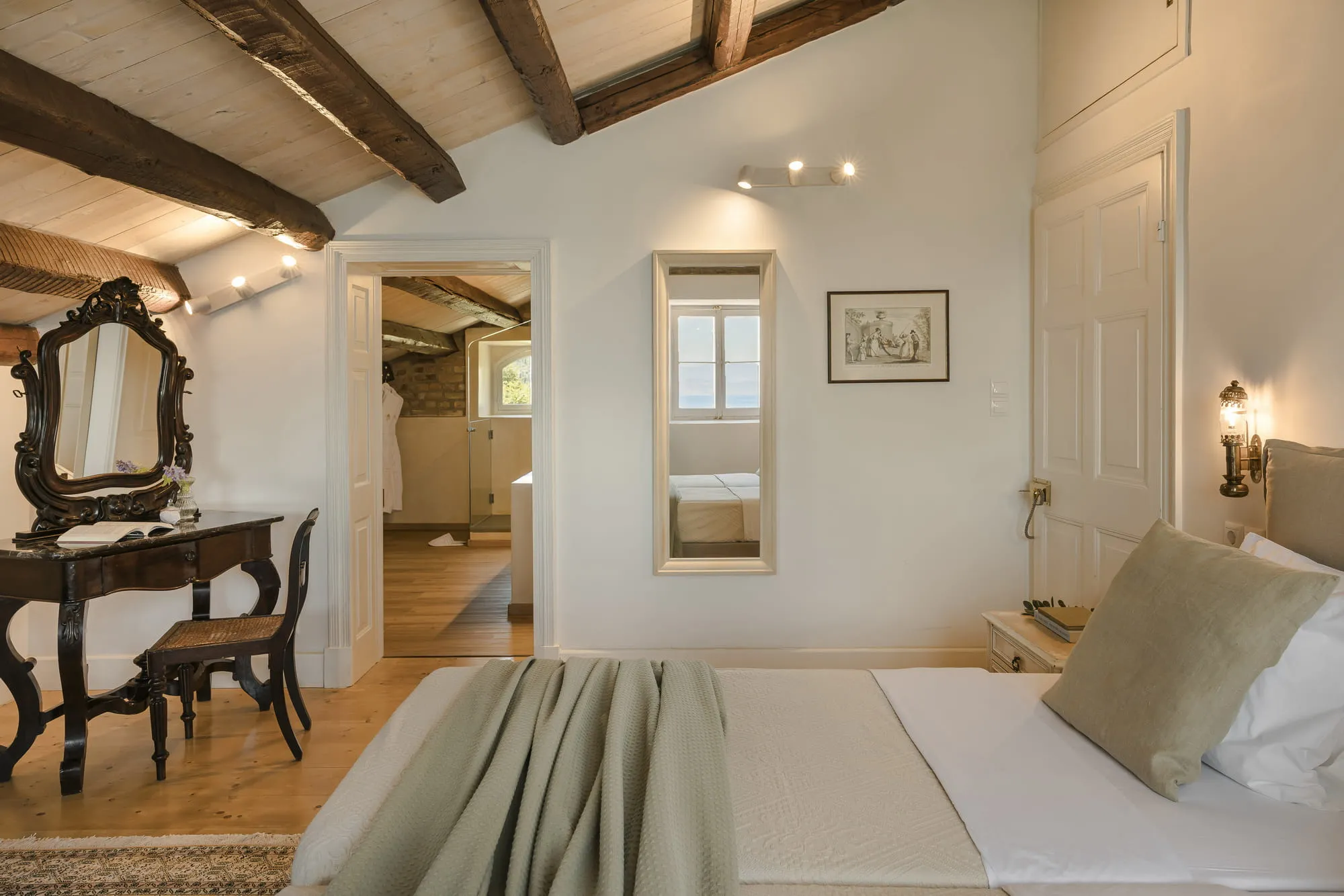 Calla bedroom leading to its en-suite bathroom 